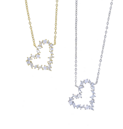 “Gold and silver heart-shaped pendant necklaces with sparkling crystal stones, elegant women’s jewelry for everyday wear and gifting.”